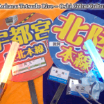 A set of Japanese railway-themed fan goods for Aoharu Tetsudo, including red and blue oshi-color uchiwa, glowing light sticks, and station-style name tags for Utsunomiya Line and Hokuriku Line.
