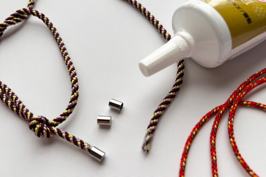 Jewelry-making supplies and adhesive.