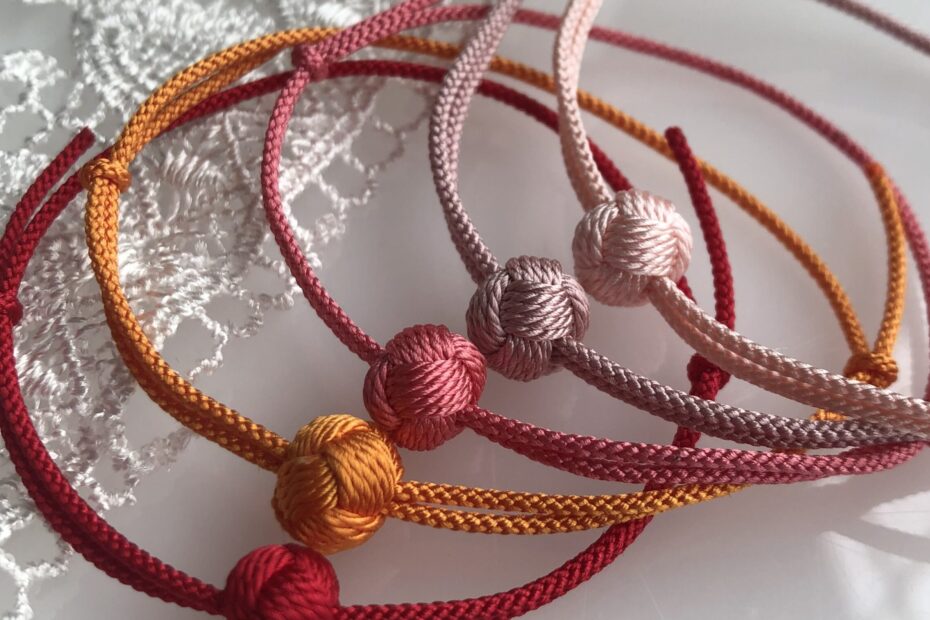 Colorful braided silk bracelets with sliding knots