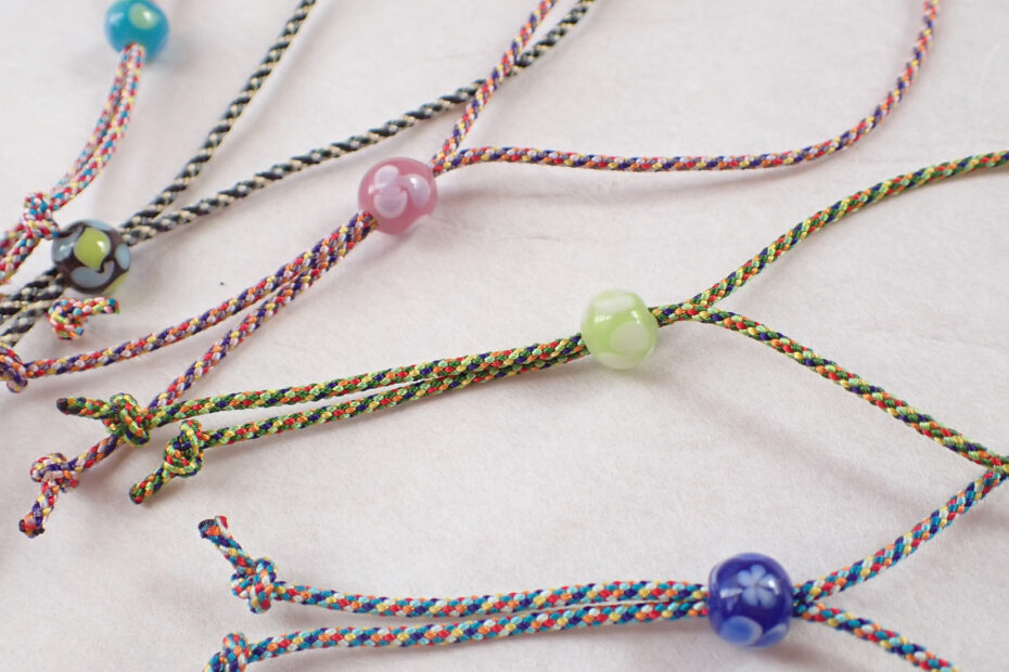 Colorful braided cords with decorative beads